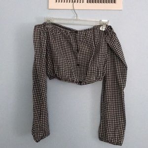 Across the shoulder plaid blouse